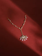 Gold-Polished White Kundan-Studded Pearl Beaded Matha Patti - Ruby Raang | Grocsy