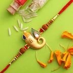 Spiritual Lord Ganesha Rakhi & Kaju Roll Box | Grocsy