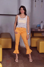 Jompers Women Mustard Smart Fit Solid Bottom Flared Trousers | Grocsy
