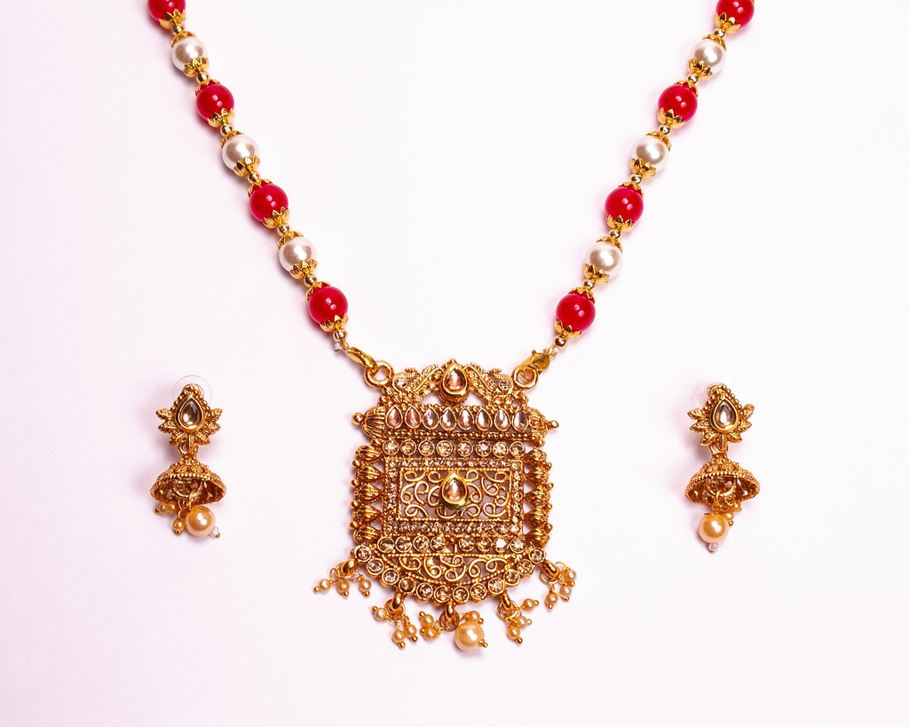 Gold-Polished Alloy Pearl And Beads Mala Pendant Set - The Pari | Grocsy