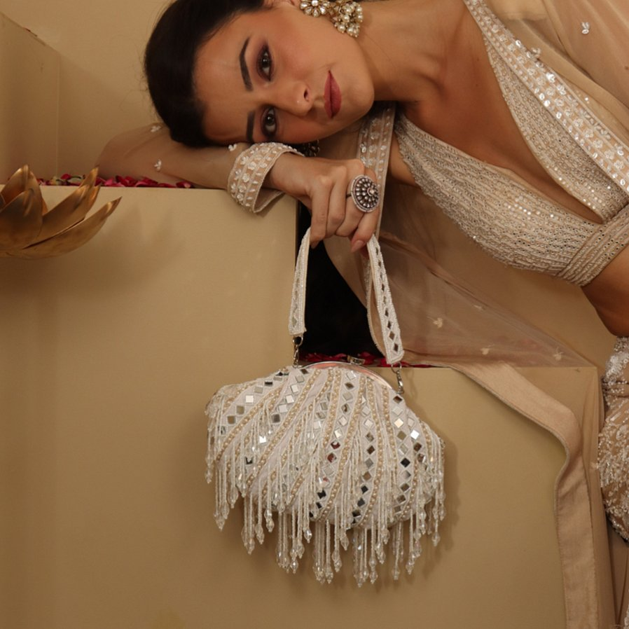 New Stylish Partywear White Mirror Work Potli Bag for Womens by House of Ree - Swadesiicart