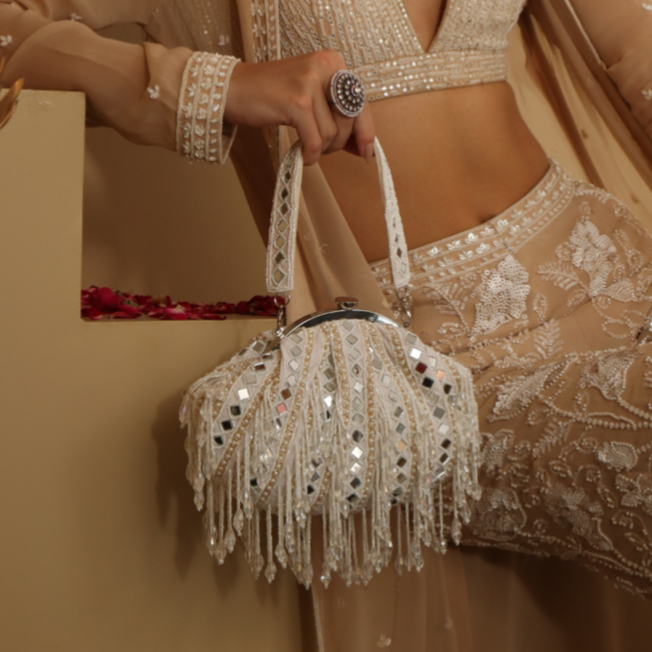 New Stylish Partywear White Mirror Work Potli Bag for Womens by House of Ree - Swadesiicart