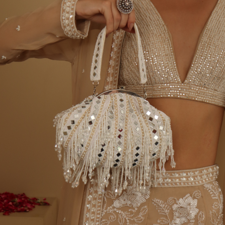 New Stylish Partywear White Mirror Work Potli Bag for Womens by House of Ree - Swadesiicart