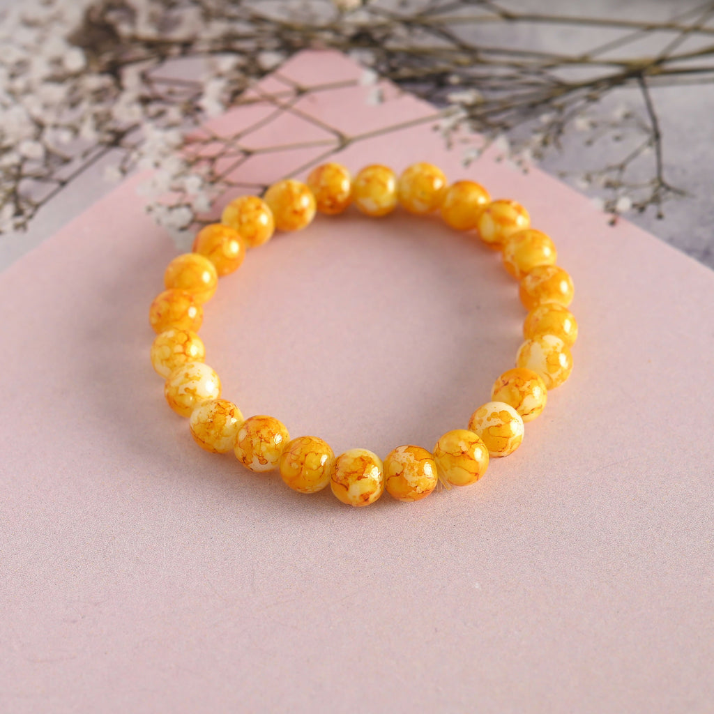 NVR Men & Women Yellow Marbel Crystal Elasticated Bracelet | Grocsy