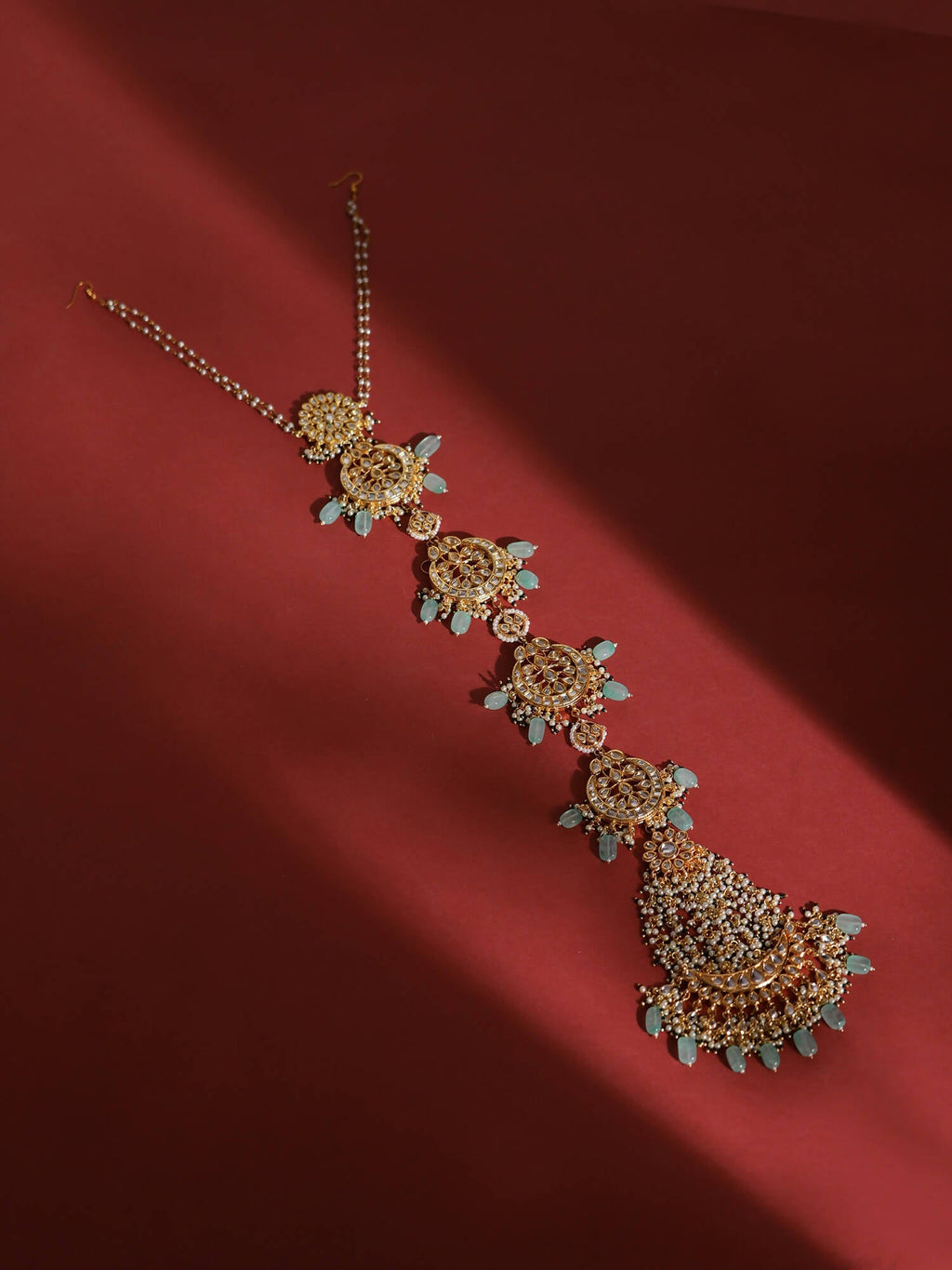 Gold-Polished White Blue Kundan-Studded Pearl Beaded Matha Patti - Ruby Raang | Grocsy