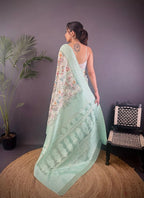 Elora Cyan Blue Silk Floral Motifs Coppery Tone Contrast Floral Border Banarasi Saree | Grocsy