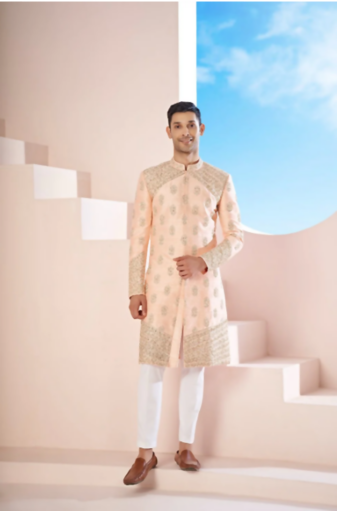 The Peach Sherwani Features Hexagonal Butas , V-Shaped Floral Jal Borders by Hilo Design | Grocsy