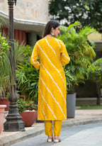 Juniper Women's Yellow Lehriya Printed Musline Kurta Set With Mirror Work & Sequins | Grocsy