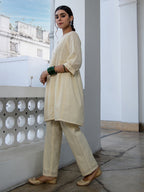 Janasya A-Line Dobby Cotton Cream Self Design V-Neck Tunic & Bottom | Grocsy