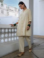 Janasya A-Line Dobby Cotton Cream Self Design V-Neck Tunic & Bottom | Grocsy