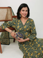 Janasya Straight Cambric Green Ethnic Motifs V-Neck Set | Grocsy