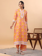 Janasya Straight Cambric Orange Floral Band Collar Kurta & Bottom | Grocsy