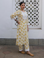 Janasya Straight Cambric Off White Floral Notch Neck Kurta & Bottom | Grocsy