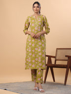 Janasya Regular Cambric Lime Green Floral Round Neck Kurta & Bottom | Grocsy