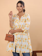 Janasya Pleated Cambric White Ikkat Notch Neck Tunic | Grocsy
