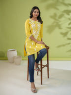 Janasya Straight Cotton Cambric Yellow Ethnic Motifs Round Neck Tunic | Grocsy