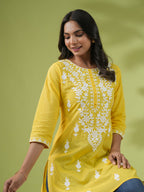 Janasya Straight Cotton Cambric Yellow Ethnic Motifs Round Neck Tunic | Grocsy