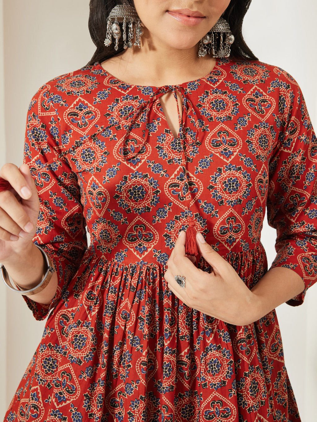 Janasya Rust Peplum Cotton Top | Grocsy