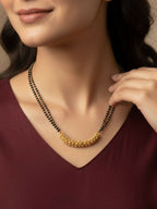 NVR Women Gold Plated Black Beaded Mangalsutra | Grocsy