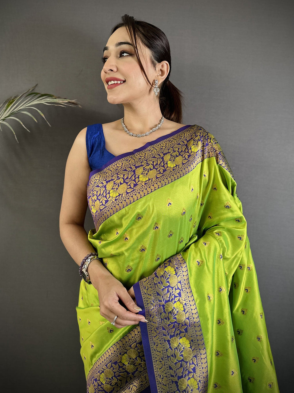 Elora Green Soft Silk Intricate Motifs Zari Weaving Banarasi Saree With Contrast Weaving Border | Grocsy