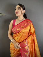 Elora Orange Soft Silk Intricate Motifs Zari Weaving Banarasi Saree With Contrast Weaving Border | Grocsy