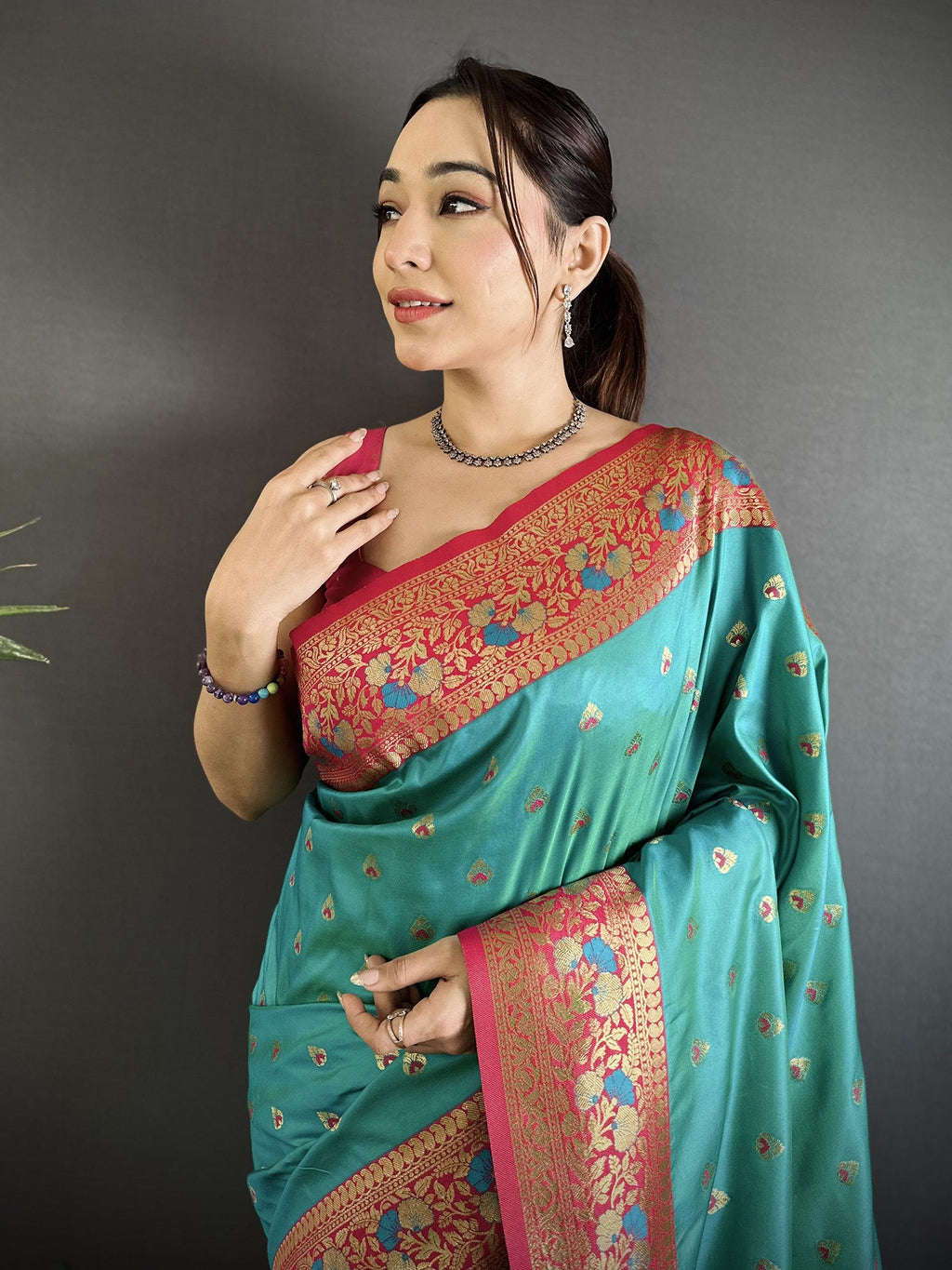 Elora Teal Blue Soft Silk Intricate Motifs Zari Weaving Banarasi Saree With Contrast Weaving Border | Grocsy