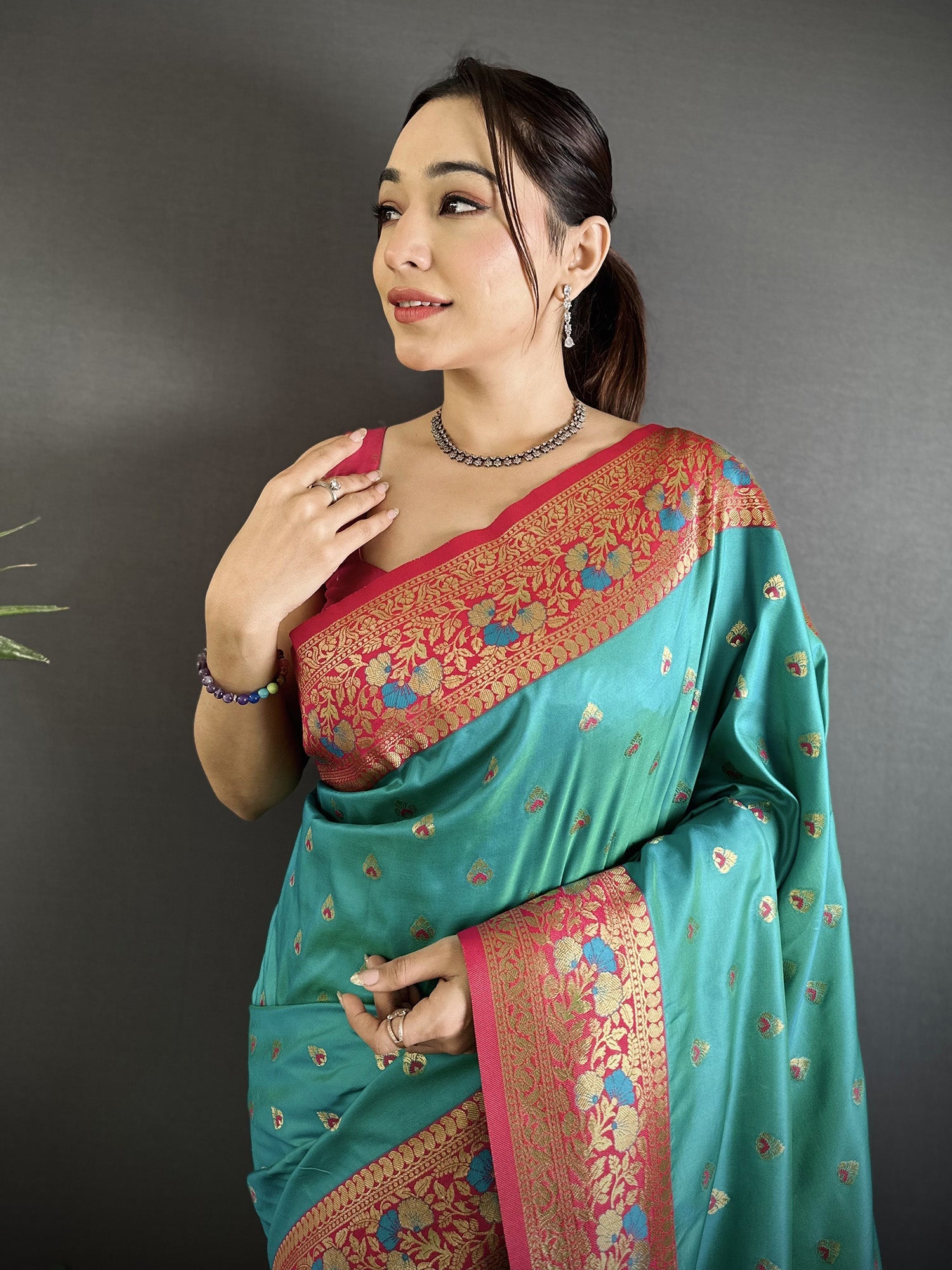 Elora Teal Blue Soft Silk Intricate Motifs Zari Weaving Banarasi Saree With Contrast Weaving Border | Grocsy