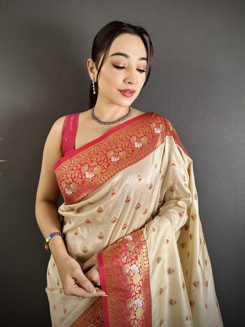 Elora Off White Soft Silk Intricate Motifs Zari Weaving Banarasi Saree With Contrast Weaving Border | Grocsy