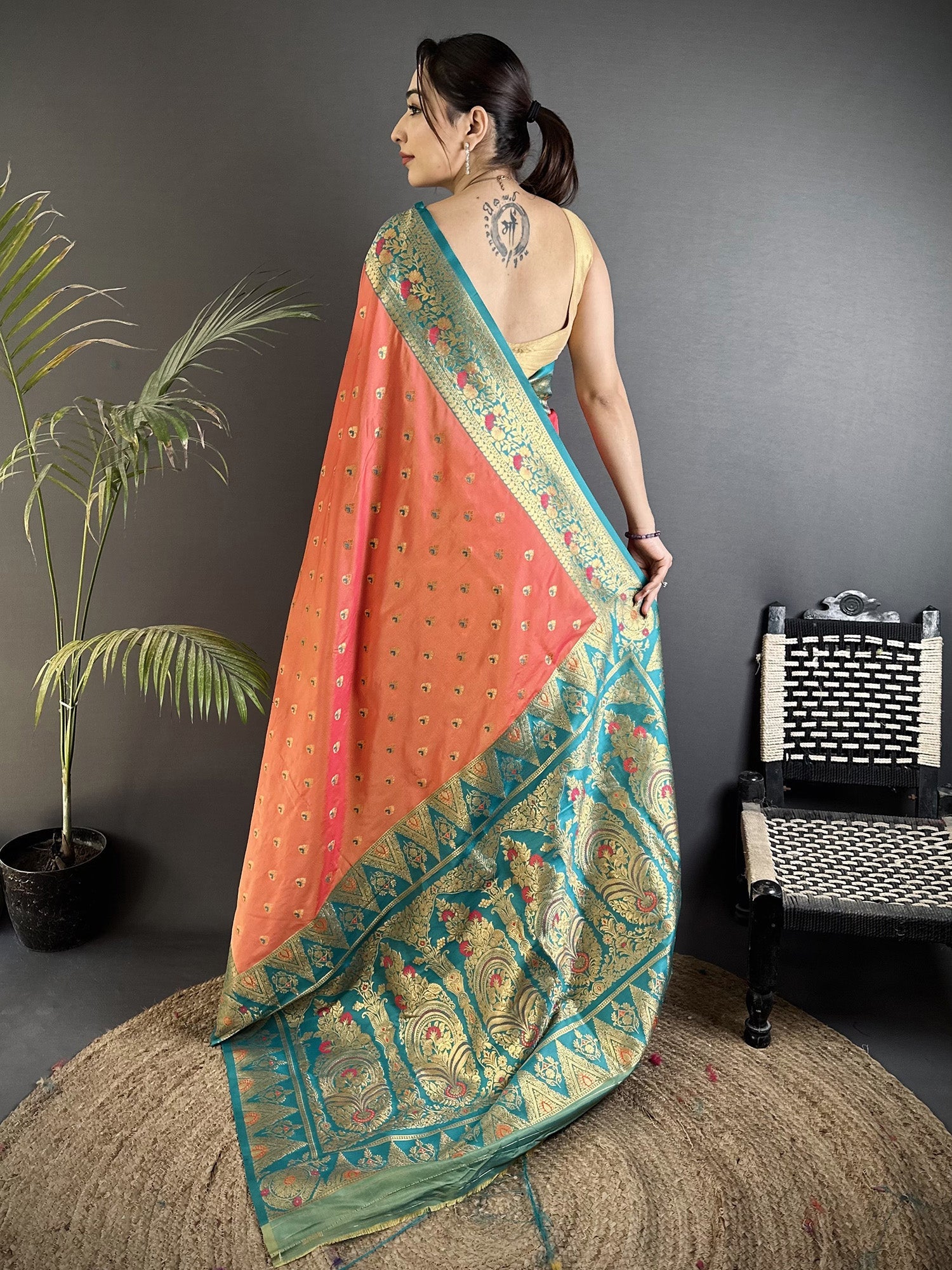 Elora Coral Pink Soft Silk Intricate Motifs Zari Weaving Banarasi Saree With Contrast Weaving Border | Grocsy