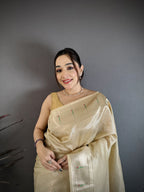 Elora Beige Tissue Solid Zari Weaving Paithani Saree With Muniya Border | Grocsy