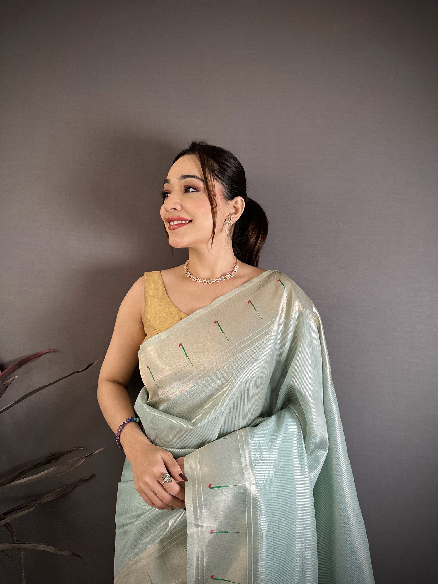 Elora Light Blue Tissue Solid Zari Weaving Paithani Saree With Muniya Border | Grocsy