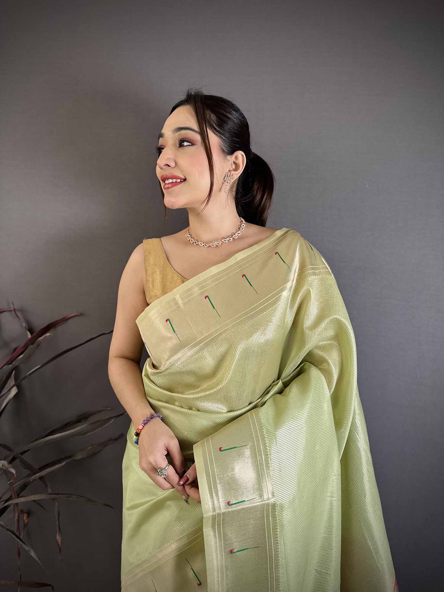 Elora Light Green Tissue Solid Zari Weaving Paithani Saree With Muniya Border | Grocsy