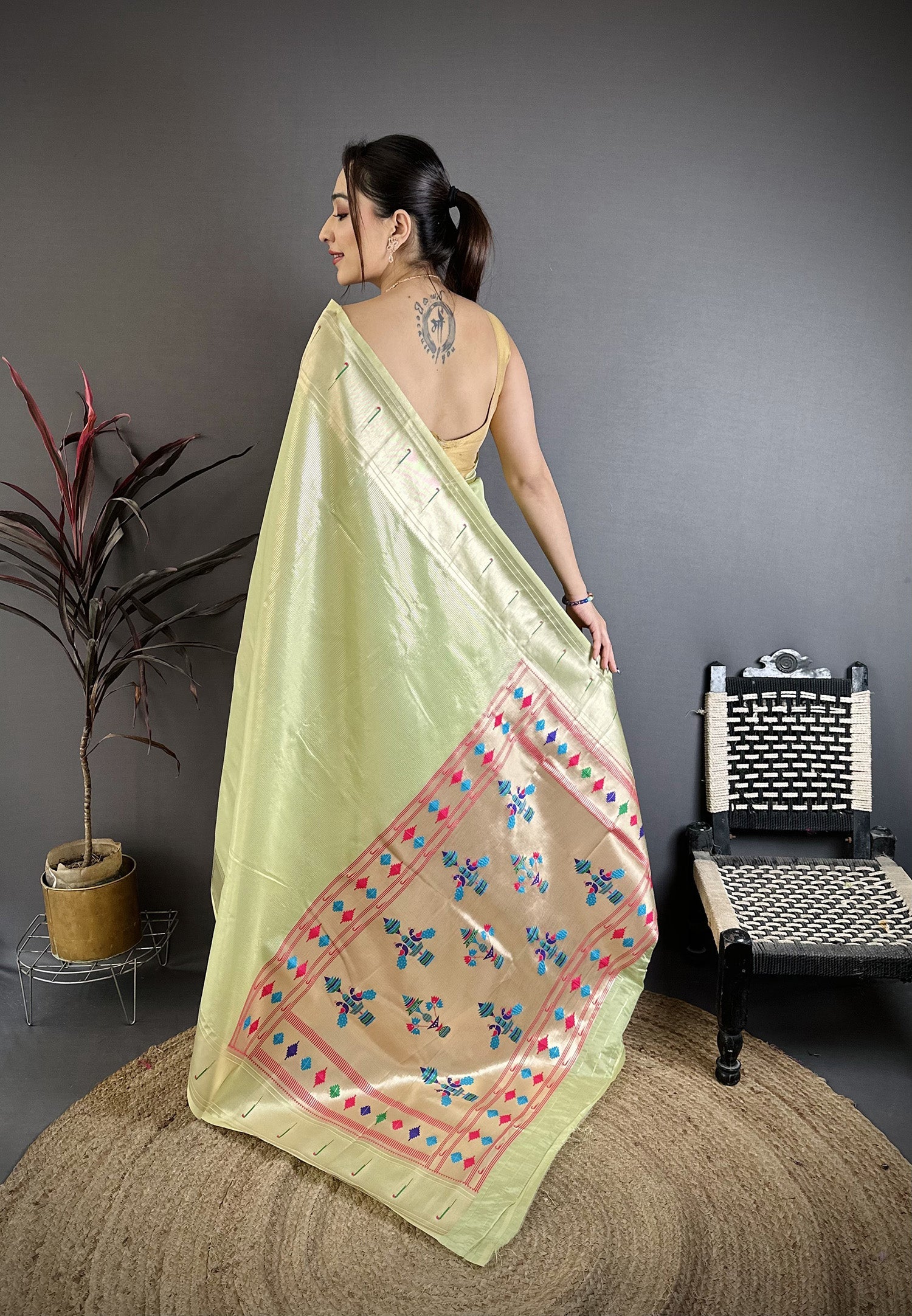 Elora Light Green Tissue Solid Zari Weaving Paithani Saree With Muniya Border | Grocsy