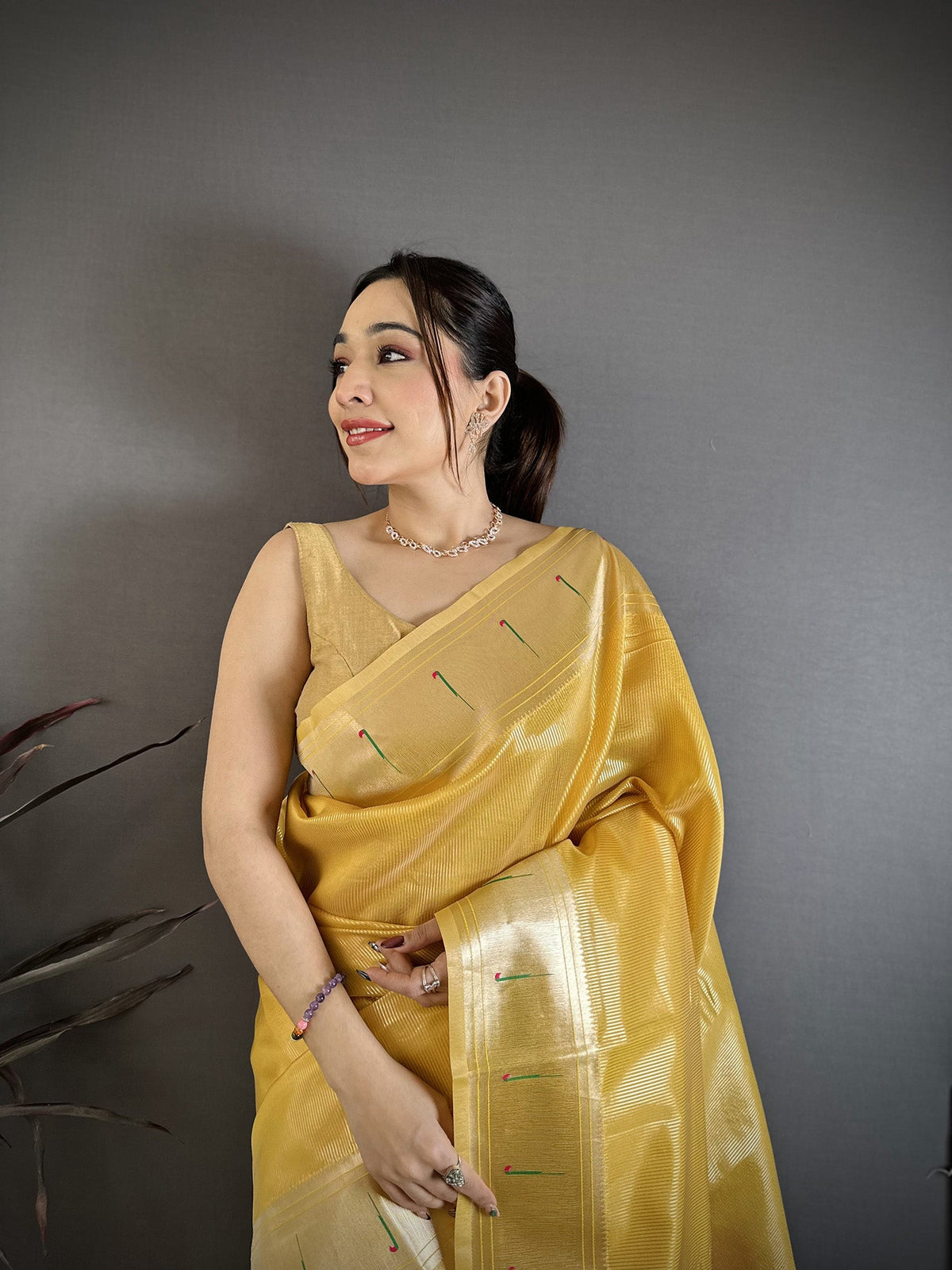 Elora Golden Yellow Tissue Solid Zari Weaving Paithani Saree With Muniya Border | Grocsy