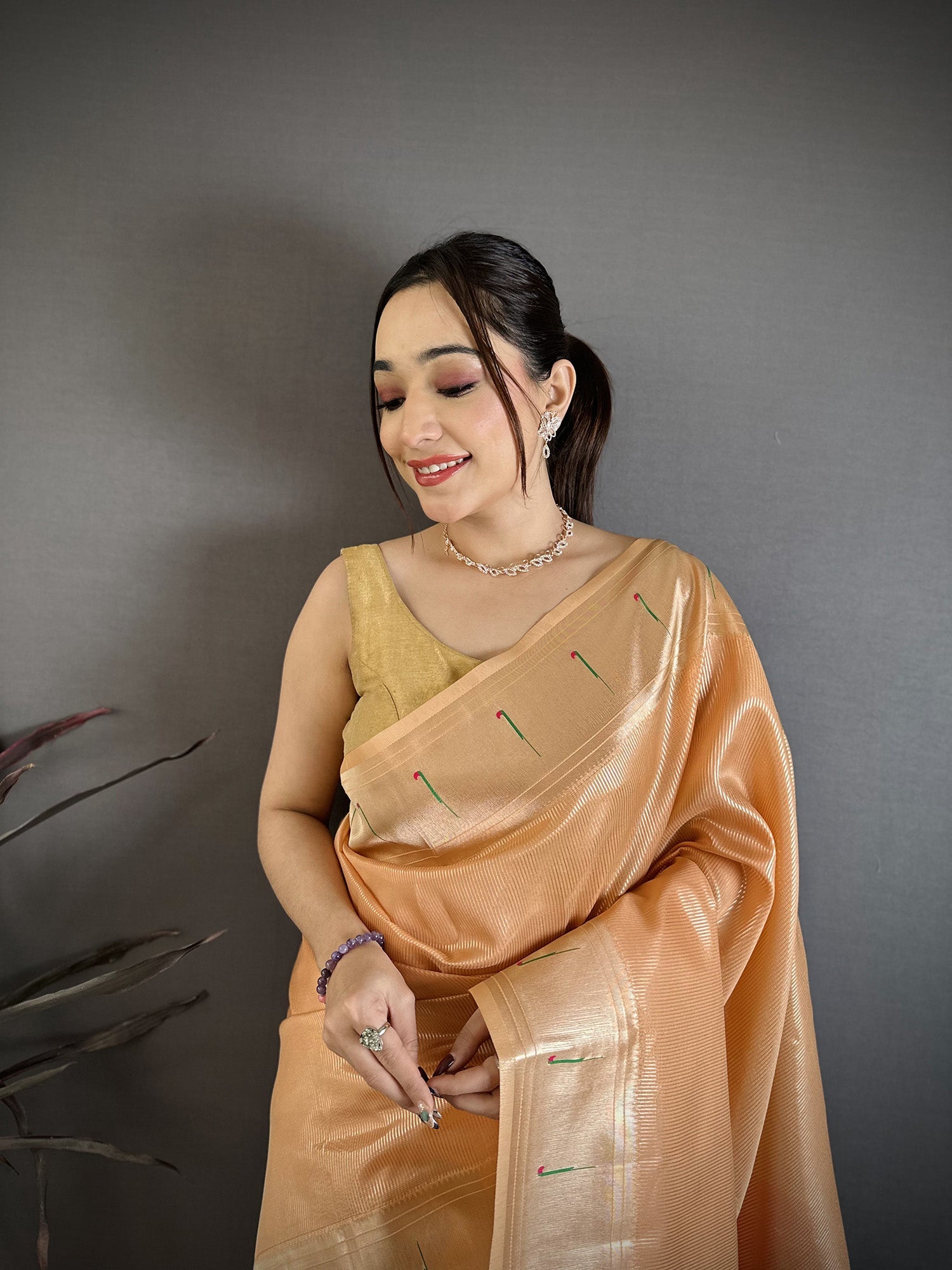 Elora Orange Tissue Solid Zari Weaving Paithani Saree With Muniya Border | Grocsy