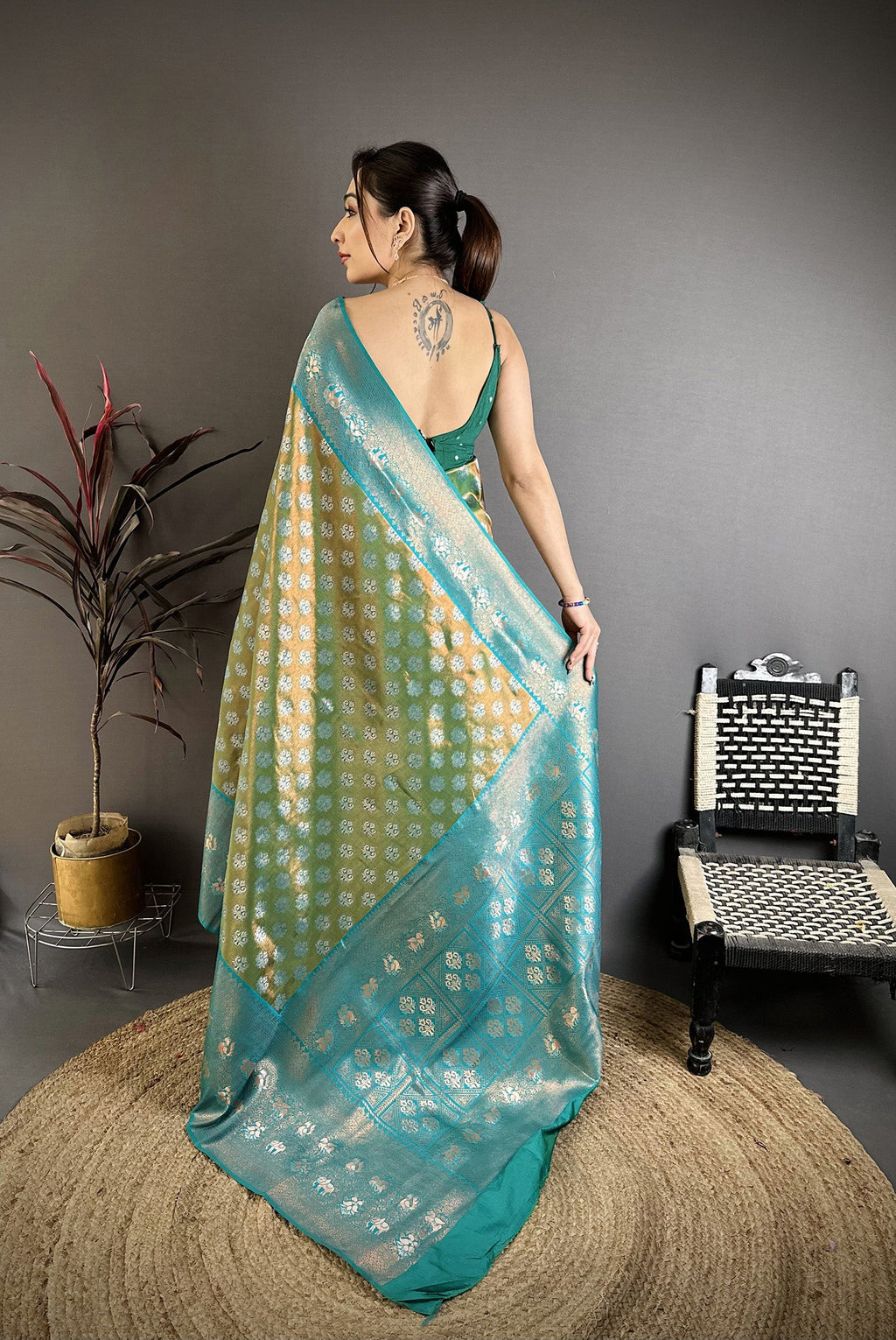 Elora Teal Green Tissue Silk Floral Pattern With Copper Motifs Banarasi Saree | Grocsy