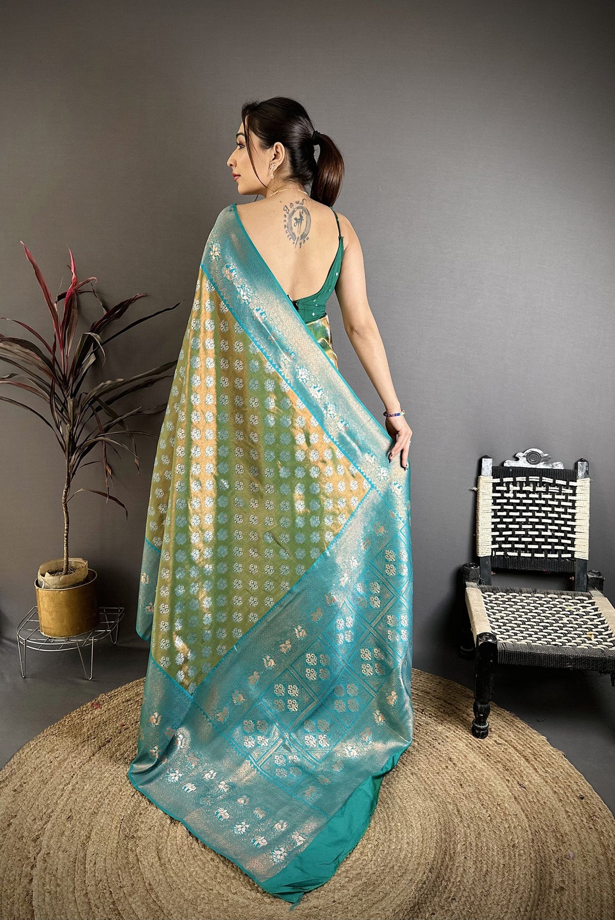 Elora Teal Green Tissue Silk Floral Pattern With Copper Motifs Banarasi Saree | Grocsy