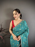 Elora Rama Green Vichitra Silk Animal Motifs Foil Print Sequence Embroidery Work Bandhani Saree | Grocsy