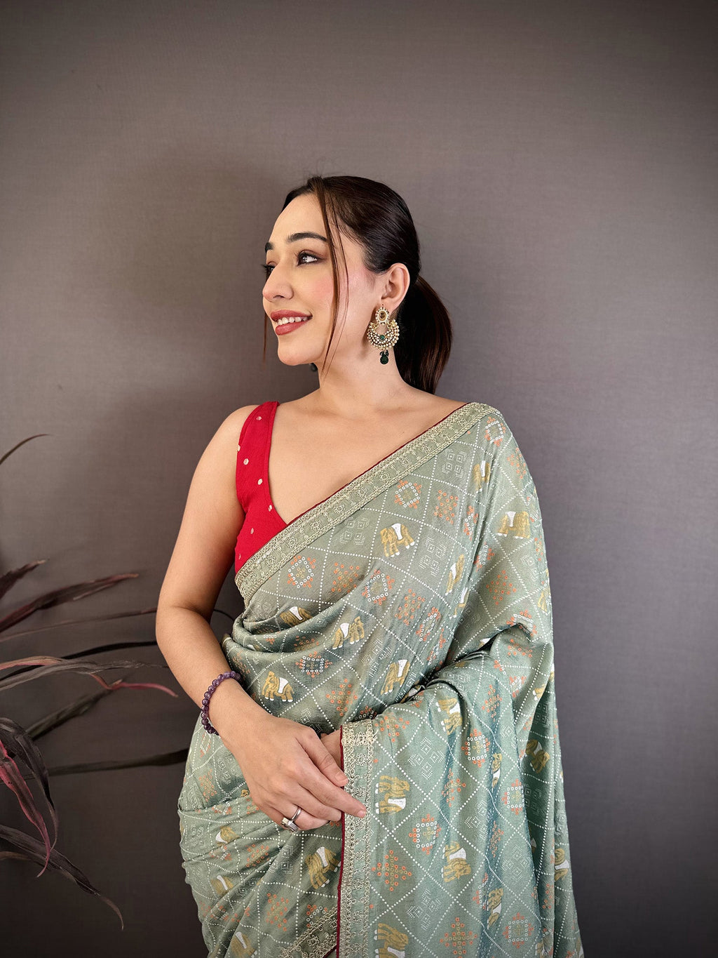 Elora Sea Green Vichitra Silk Animal Motif Foil Print Sequence Embroidery Work Bandhani Saree | Grocsy