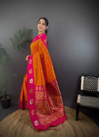 Elora Orange Soft Silk Butti Zari Weaving Contrast Weaving Border Banarasi Saree | Grocsy