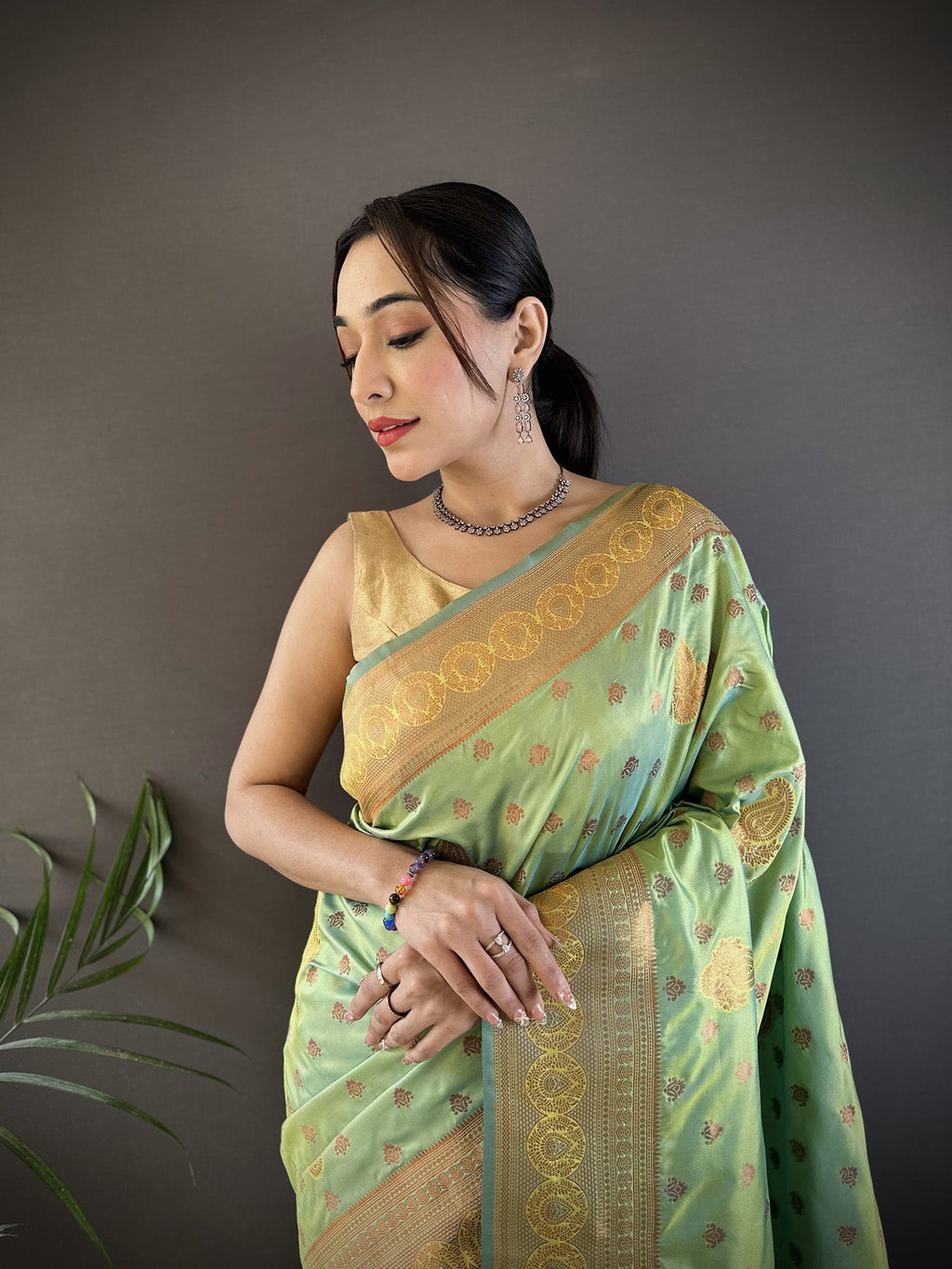 Elora Light Green Soft Silk Woven Copper Zari Weaving Banarasi Saree With Contrast Blouse | Grocsy