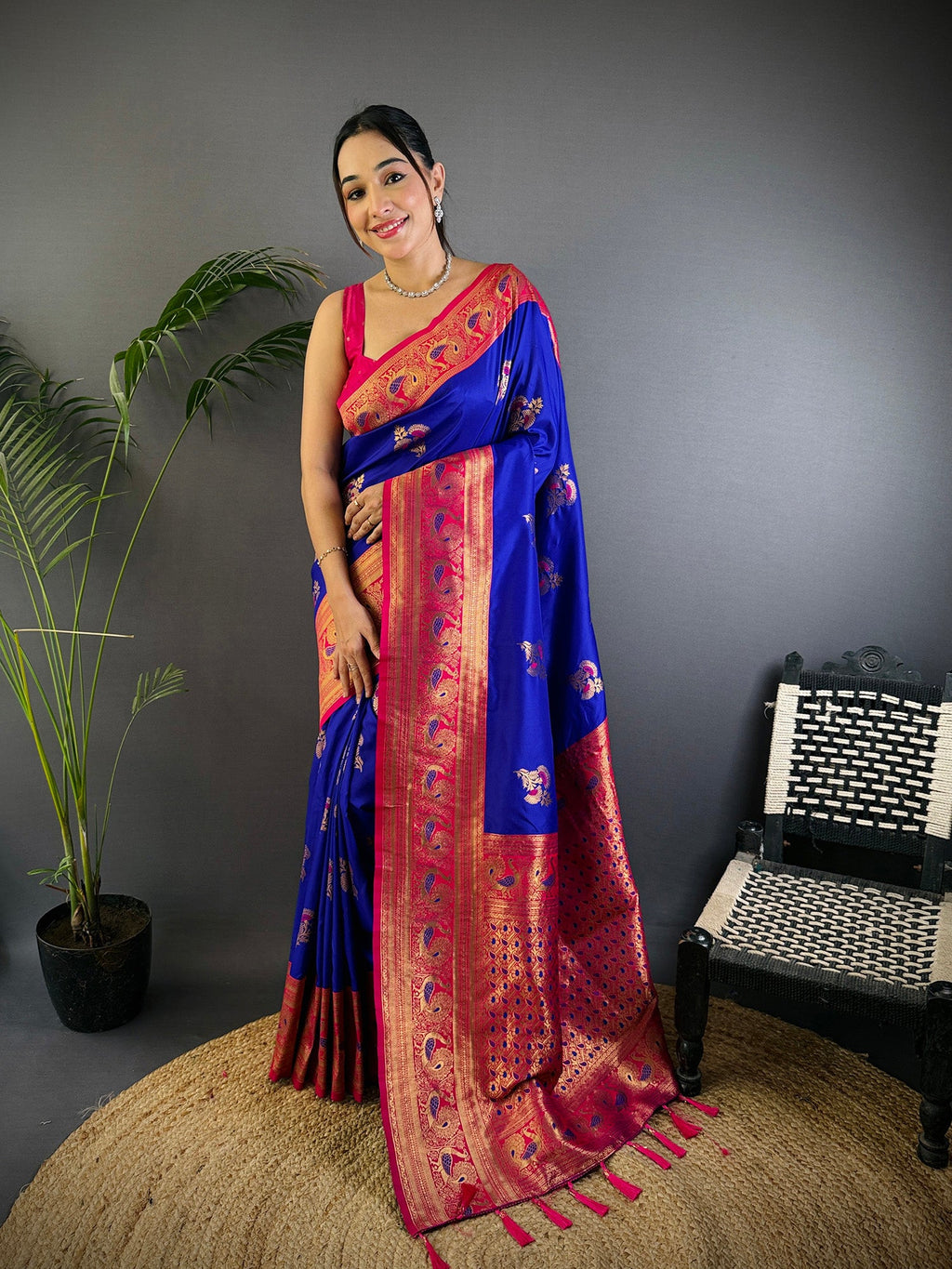 Elora Royal Blue Soft Silk Floral Butta Zari Weaving Banarasi With Peacock Zari Weaving Border | Grocsy