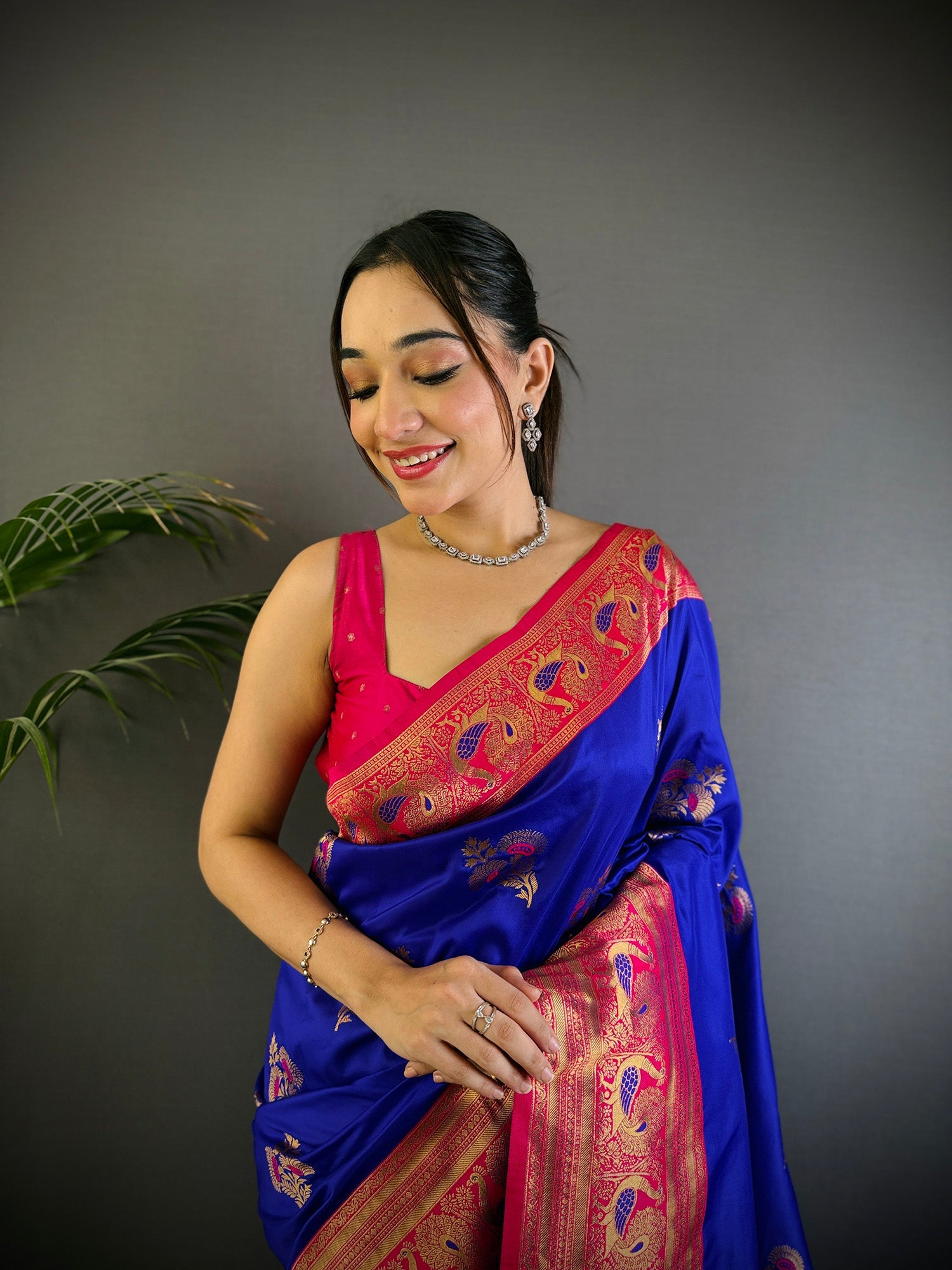 Elora Royal Blue Soft Silk Floral Butta Zari Weaving Banarasi With Peacock Zari Weaving Border | Grocsy