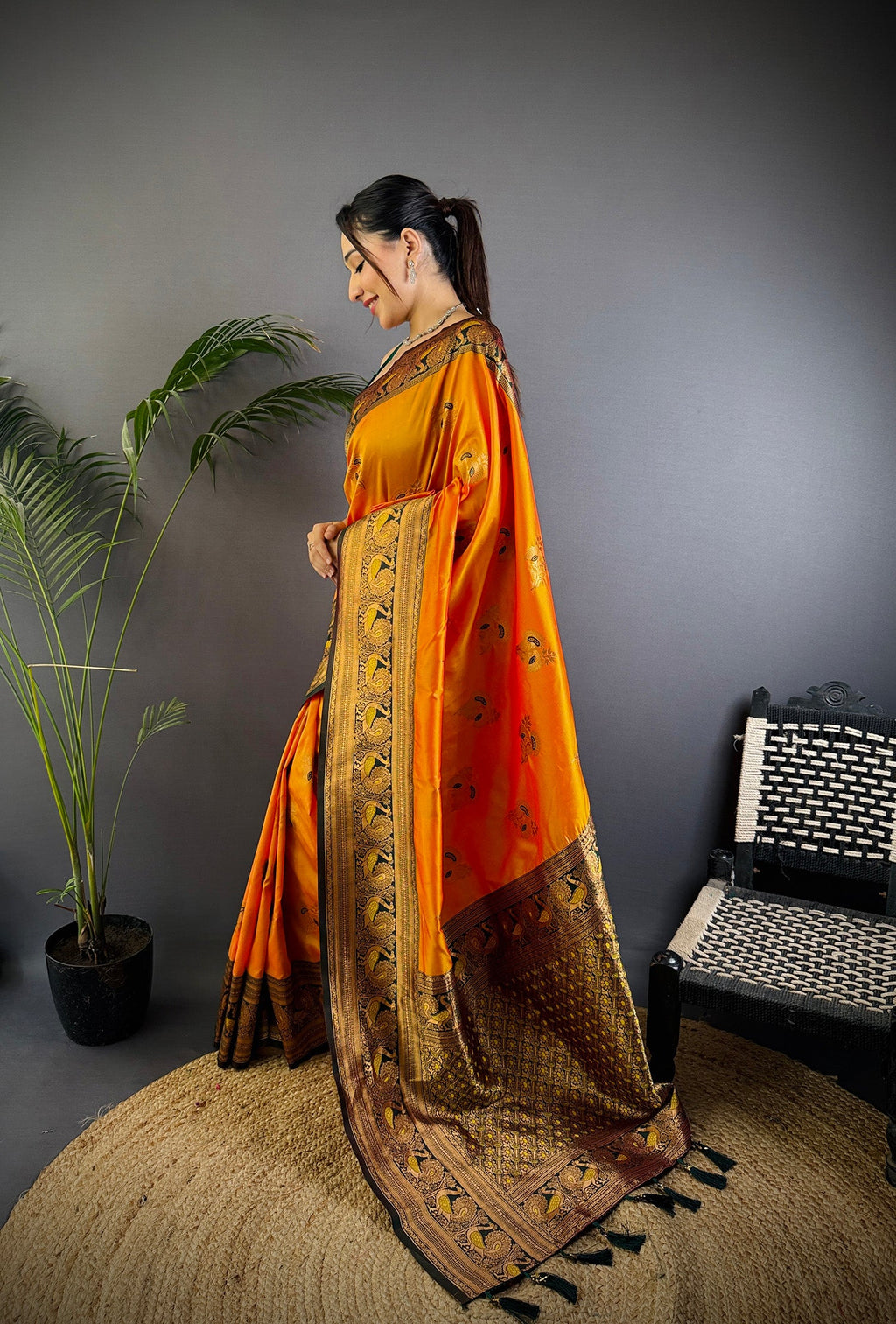 Elora Orange Soft Silk Floral Butta Zari Weaving Banarasi With Peacock Zari Weaving Border | Grocsy
