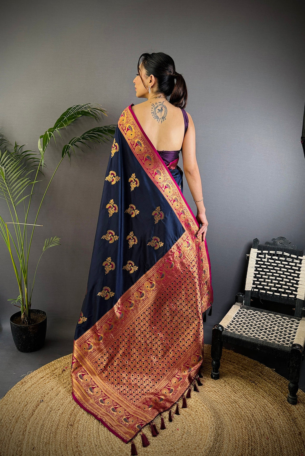 Elora Navy Blue Soft Silk Floral Butta Zari Weaving Banarasi With Peacock Zari Weaving Border | Grocsy