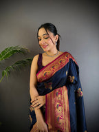 Elora Navy Blue Soft Silk Floral Butta Zari Weaving Banarasi With Peacock Zari Weaving Border | Grocsy