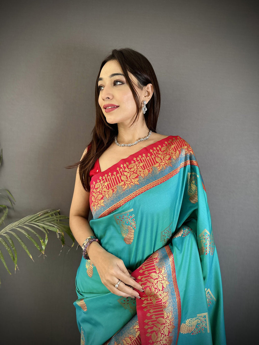 Elora Aqua Green Soft Silk Dual Zari Peacock Butta Worked Banarasi Saree | Grocsy