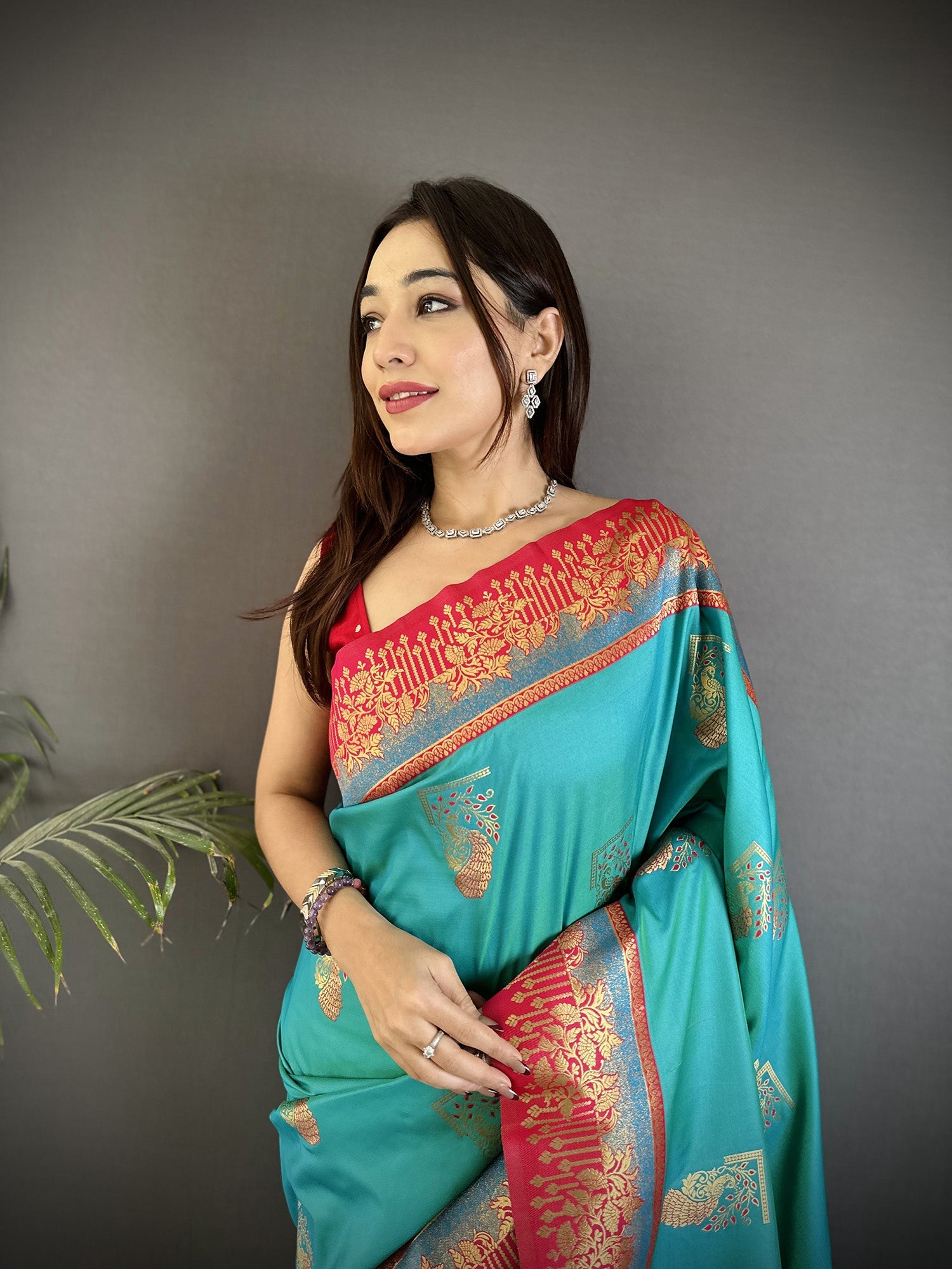 Elora Aqua Green Soft Silk Dual Zari Peacock Butta Worked Banarasi Saree | Grocsy