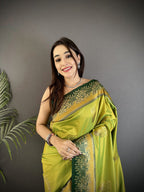 Elora Light Green Soft Silk Dual Zari Peacock Butta Worked Banarasi Saree | Grocsy