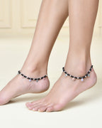Jewels Nest Traditional Silver-Plated Black Beaded Anklet with Floral Charms | Grocsy